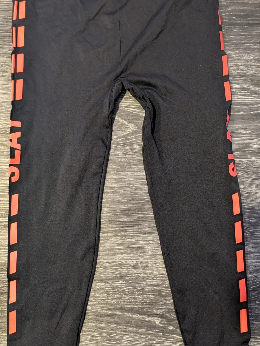 Black Leggings with Orange Side Graphic